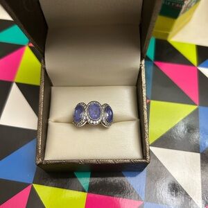 Elegant Silver and Purple Gemstone Ring